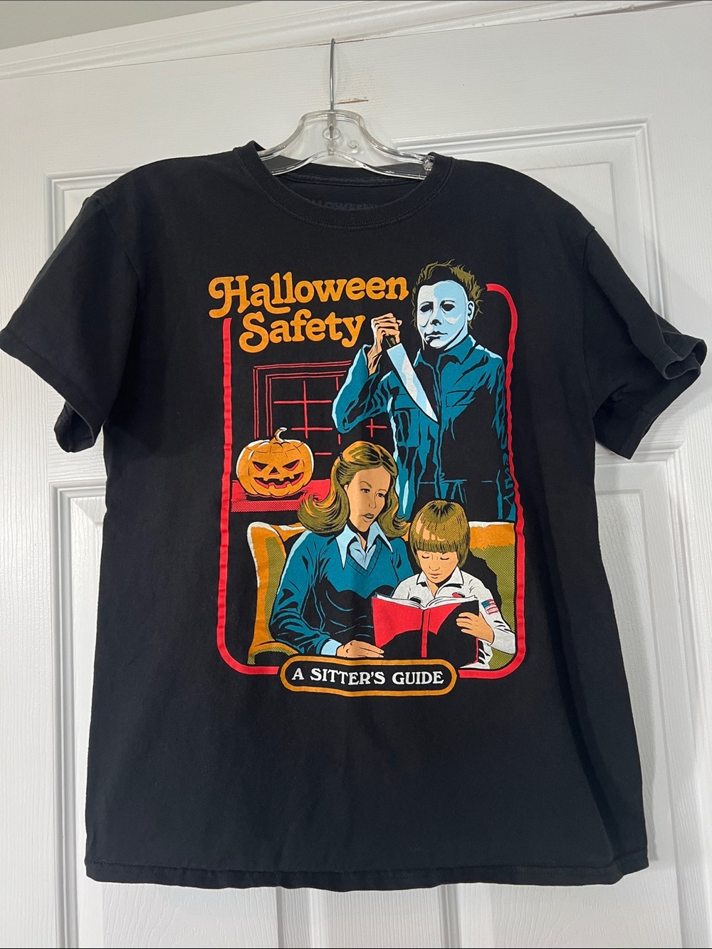 Halloween Safety Graphic Tee — Black with Orange and Blue Print